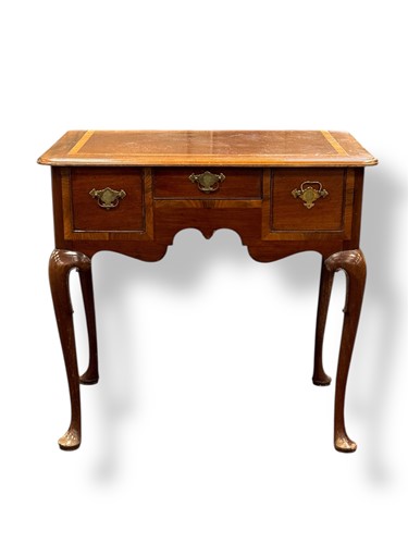 Lot 439 - A 19th century mahogany and inlaid lowboy,...