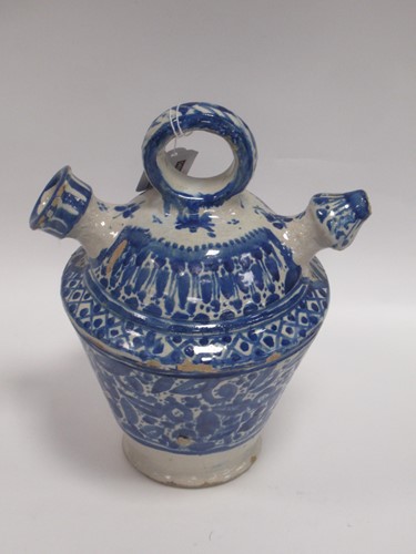 Lot 54 - A late 19th century faience water carrier with...