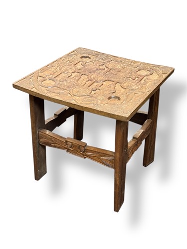 Lot 414 - A 20th century Benin African carved wood table,...