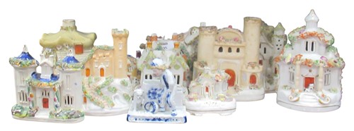 Lot 68 - A Staffordshire courting couple figural group...
