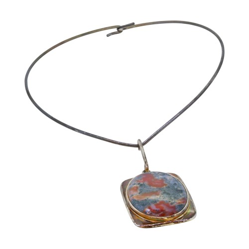 Lot 311 - Bent Knudsen, a Modernist silver and agate pendant