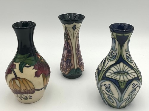 Lot 23 - Three Moorcroft vases, Anna Lily pattern,...