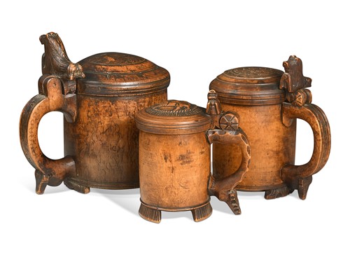 Lot 386 - A group of three Norwegian birchwood peg tankards, 18th century