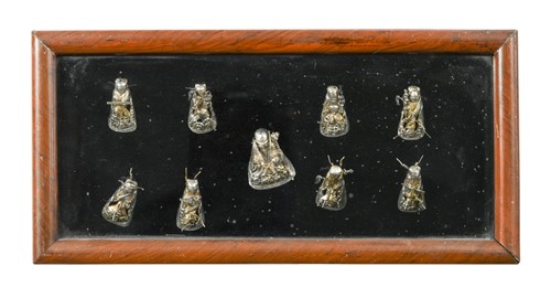 Lot 45 - A set of nine Chinese white metal figures of Daoist Immortals, Qing Dynasty