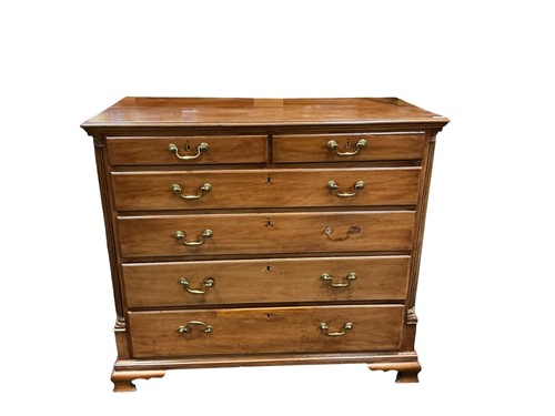 Lot 833 - A George III mahogany chest of two short and...