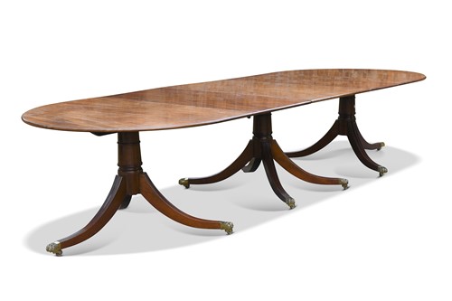 Lot 509 - A Regency style mahogany triple pedestal dining table