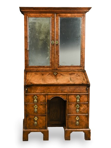 Lot 484 - A George I walnut bureau bookcase