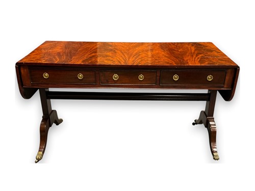 Lot 708 - A large Regency style mahogany sofa table
