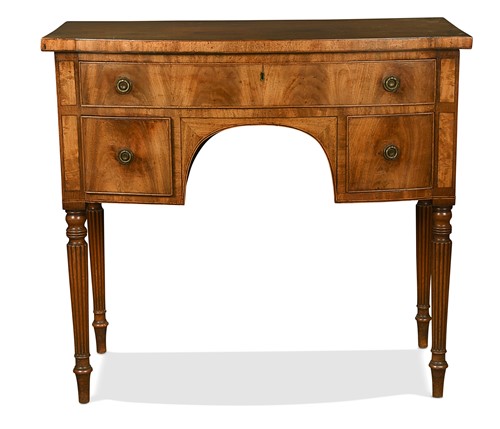 Lot 433 - A small Regency mahogany bow fronted sideboard
