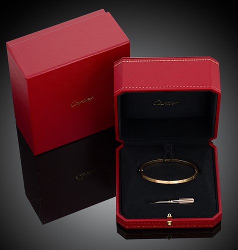 Lot 141 - Cartier - An 18ct gold 'Love' bangle with screwdriver