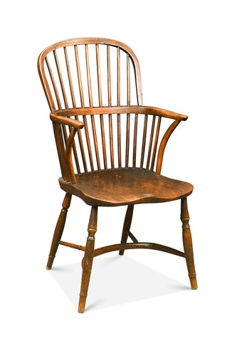 Lot 399 - A yew and elm stick back armchair, early 19th century