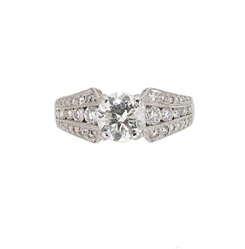 Lot 126 - A single stone diamond ring with diamond set shoulders