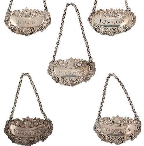 Lot 199 - A collection of five 19th century silver bottle labels