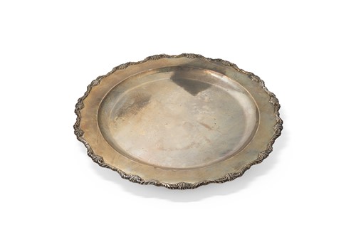 Lot 267 - A Peruvian metalwares silver charger