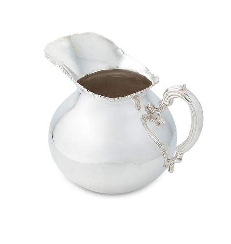 Lot 262 - A Peruvian metalwares silver water jug