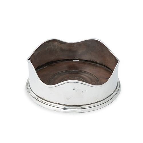 Lot 386 - Dublin - An 18th century silver bottle coaster