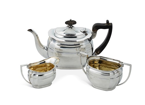Lot 335 - An Edward VII silver bachelor's three-piece tea set