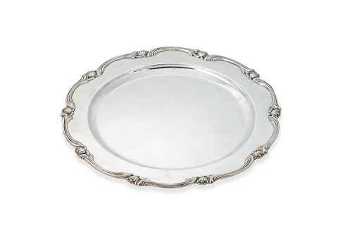 Lot 275 - A Peruvian metalwares silver charger