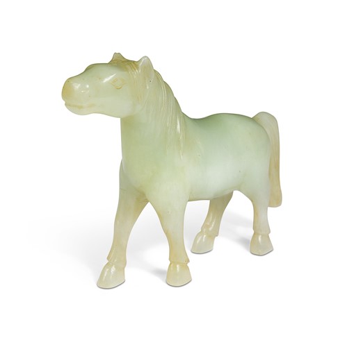 Lot 35 - A Chinese jade standing horse in Ming style, 20th century