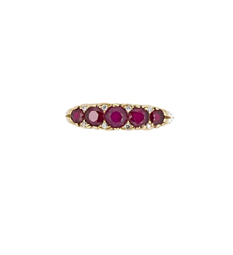 Lot 70 - A modern 18ct gold ruby and diamond carved half hoop ring