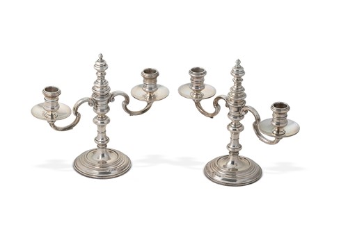 Lot 360 - A pair of George VI silver three light candelabra