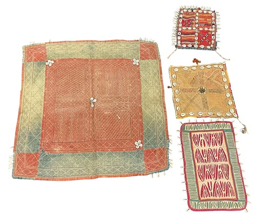 Lot 224 - A large Banjara Rumal woven mat in red and...
