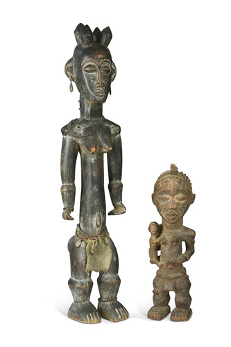 Lot 69 - A West African carved wood fertility figure of female form