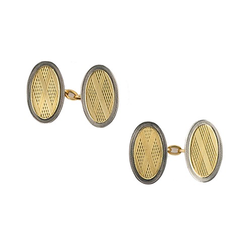 Lot 122 - A pair of early 20th century 18ct two colour gold cufflinks