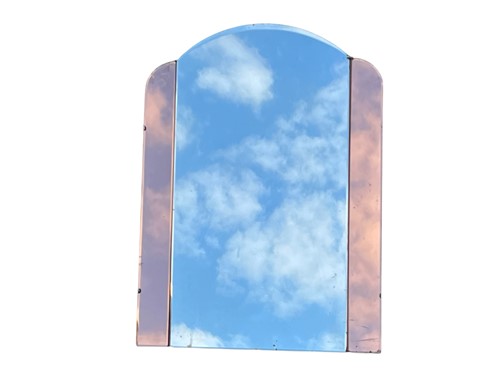 Lot 554 - Art Deco style arched mirror with peach glass...