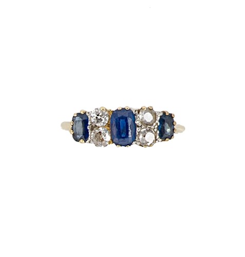 Lot 64 - An early 20th century sapphire and diamond half hoop style ring
