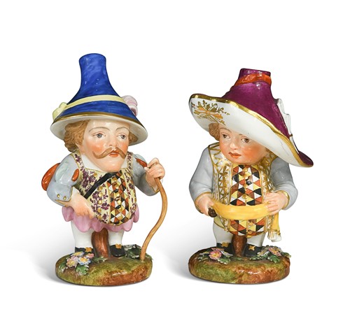 Lot 697 - A pair of Derby porcelain 'Mansion House' dwarfs, 19th century