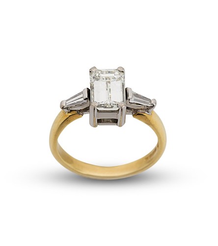 Lot 140 - A single stone diamond ring with diamond set shoulders