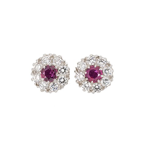 Lot 111 - A pair of ruby and diamond cluster ear studs