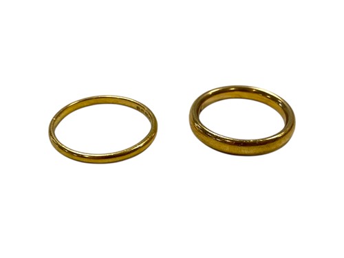 Lot 265 - Two hallmarked 22ct gold wedding bands, gross...