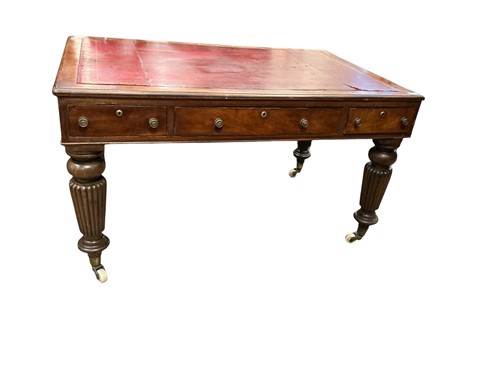 Lot 653 - A mahogany library table containing 19th century elements, adapted
