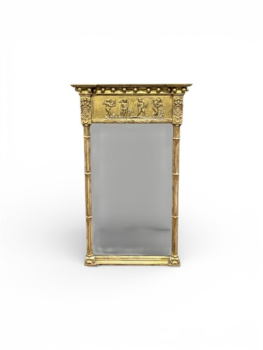 Lot 612 - A Regency gilt pier mirror, the frieze...