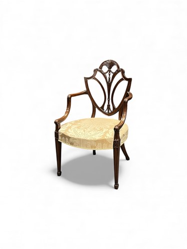 Lot 668 - A Hepplewhite-style mahogany desk chair with a...