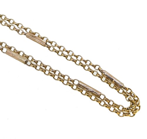 Lot 59 - A long 9ct gold chain
