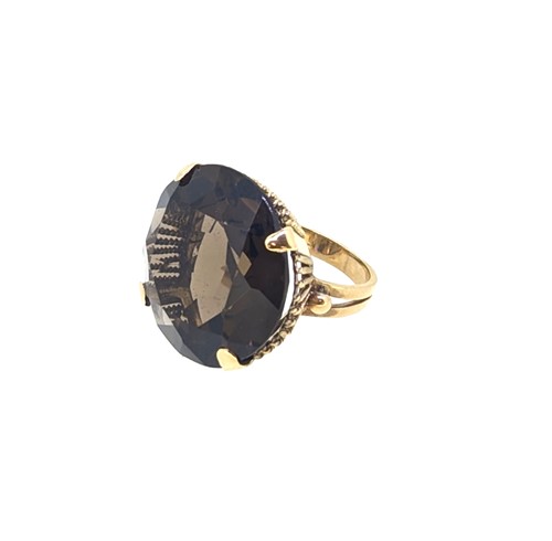 Lot 56 - A smoky quartz cocktail style dress ring