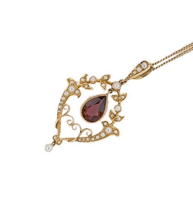 Lot 51 - An Edwardian garnet and split pearl pendant and chain