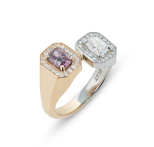 Lot 143 - A pink and white diamond crossover ring