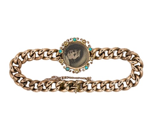 Lot 36 - A turquoise and split pearl memorial centrepiece bracelet