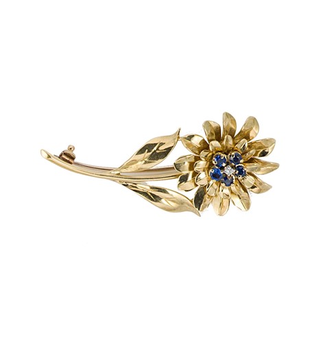 Lot 63 - A sapphire and diamond flower brooch
