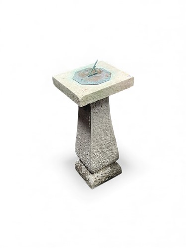 Lot 800 - A stone and copper sundial, the chiselled...