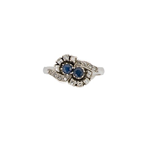 Lot 66 - An 18ct gold sapphire and diamond crossover ring