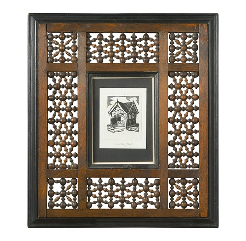 Lot 113 - Possibly retailed by Liberty & Co., a mashrabiya panel picture frame, circa 1900