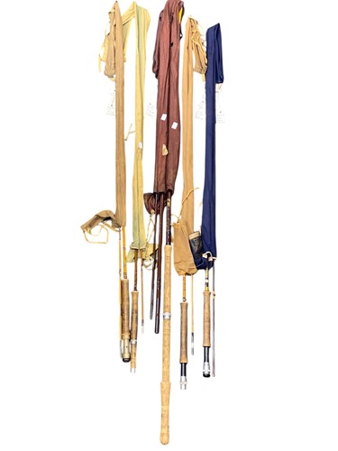 Lot 89 - A collection of fishing rods, to include: a...