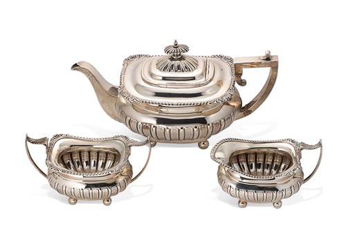Lot 347 - A George V silver three-piece tea set