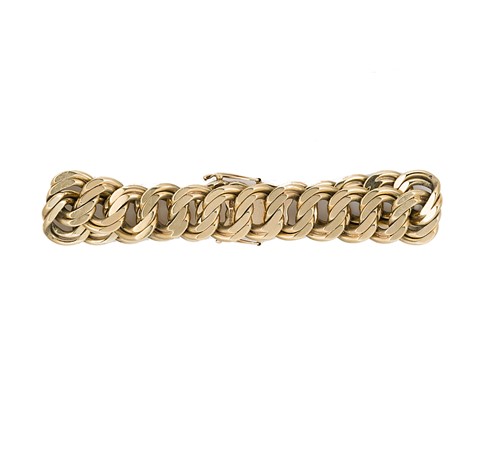 Lot 92 - A late 20th century 9ct gold double curb bracelet