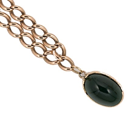 Lot 35 - A 9ct gold late 20th century green hardstone bracelet